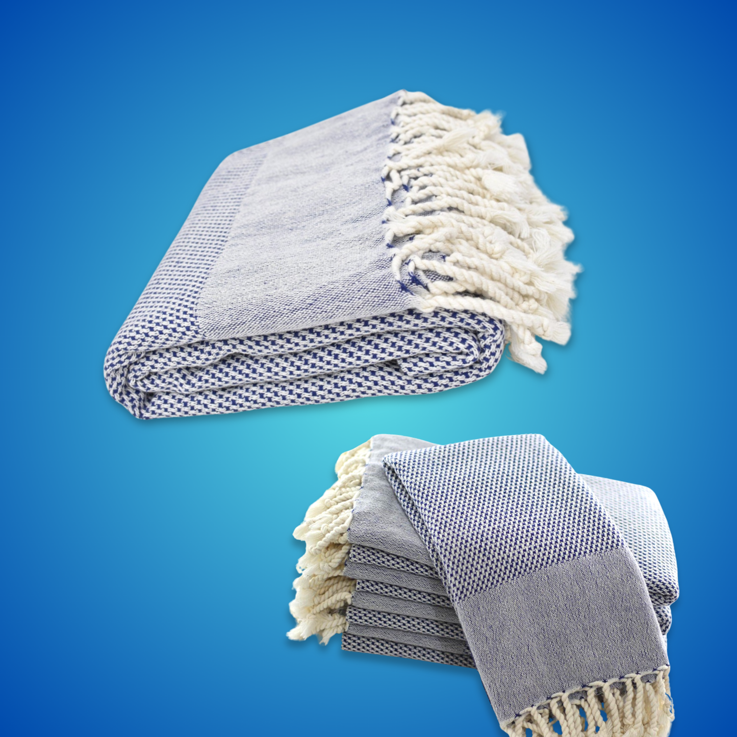 INDIGO Turkish Towel Set featuring a navy bath towel and hand towel with a honeycomb weave, flat-woven texture, and hand-tied fringes, displayed folded on a blue background