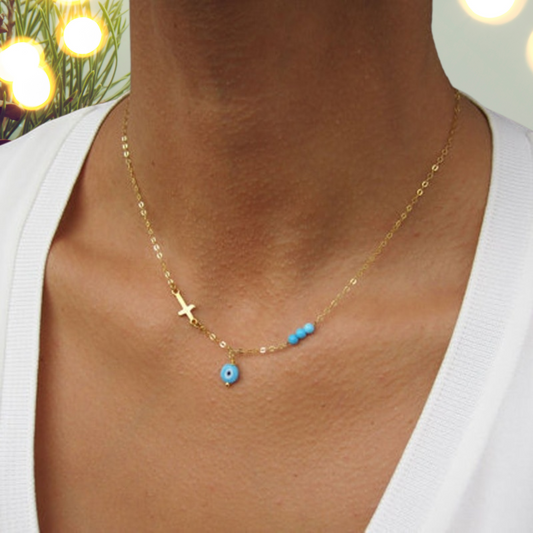 Turquoise evil eye necklace with cross charm, delicate gold colour chain, perfect Christmas gift idea