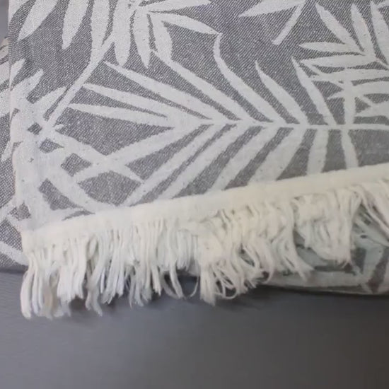 LEAVES Turkish towel throw with leaf pattern and fringes, soft and lightweight for versatile home decor use