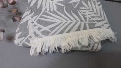 LEAVES Turkish towel throw with leaf pattern and fringes, soft and lightweight for versatile home decor use